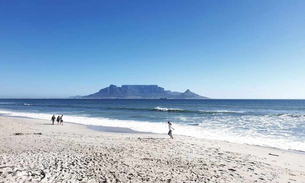 Best beaches in Cape Town, Clifton Beach Cape Town, Camps Bay Beach, Muizenberg surfing, Bloubergstrand Table Mountain view, Cape Town beach guide, Surf beaches Cape Town, Cape Town coastal attractions, Kitesurfing Bloubergstrand, Atlantic Seaboard beaches